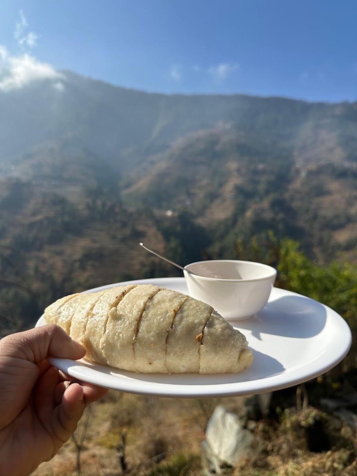 Tea and bread served outdoors