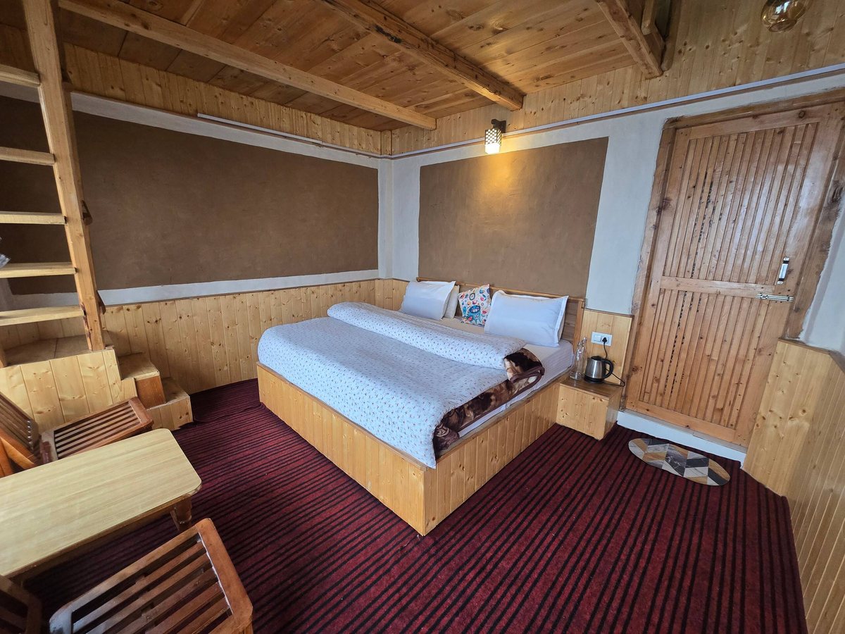 Mudhouse bedroom with wooden interiors